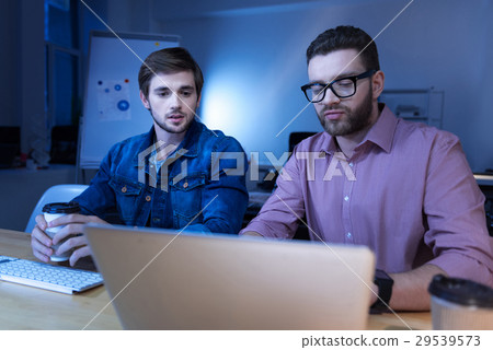 Nice brutal men using laptop Nice brutal men using laptop 29539573