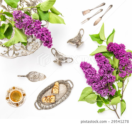 Coffee cake antique silver dishes Lilac flowers Coffee cake antique silver dishes Lilac flowers 29541278
