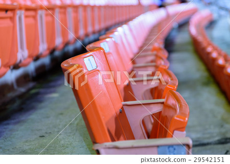 Row of orange seat for watch some sport  29542151