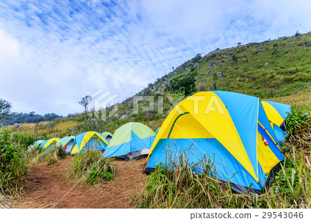 Mountain landscape with tourist tents on hill. 29543046