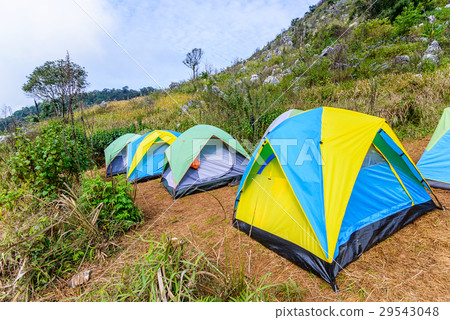 Mountain landscape with tourist tents on hill. 29543048