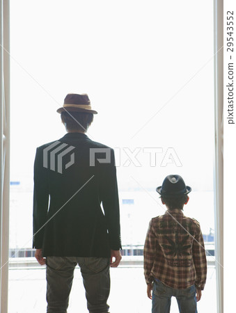 Father and son looking out 29543552