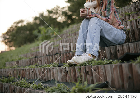 Women sitting on the stairs 29544456