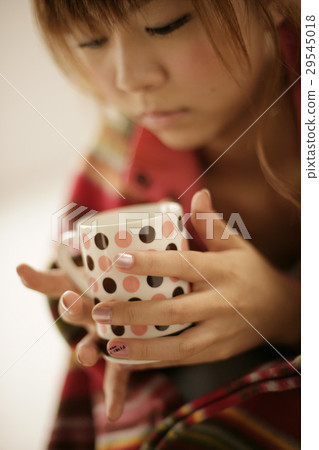 A woman with a mug A woman with a mug 29545018