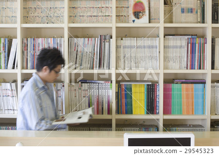 A man looking for a book 29545323