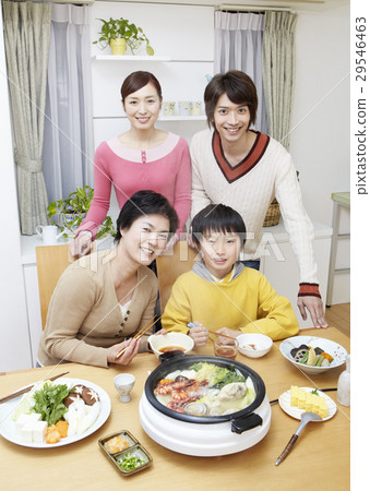 Three generations family surrounding a pod 29546463