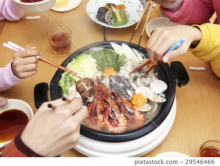 Parent and child hands surrounding a gable pod 29546466