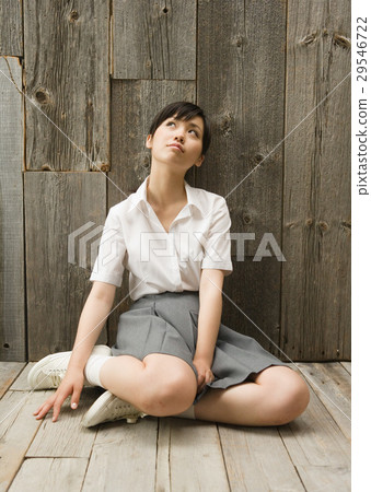 School girls sitting on the floor 29546722