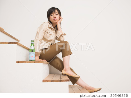 A girl sitting on the stairs A girl sitting on the stairs 29546856