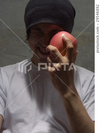 A man with an apple 29546892