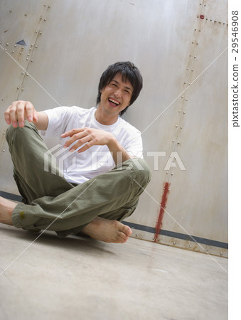 Seated man 29546908