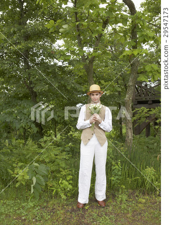 A groom with a bouquet A groom with a bouquet 29547173