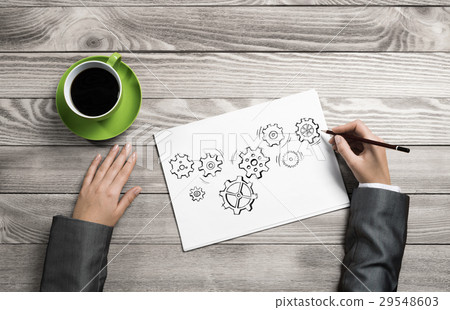 Businesswoman sketching teamwork concept Businesswoman sketching teamwork concept 29548603