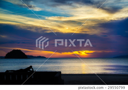 Man sleeping on the sun with beautiful sky 29550799