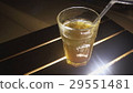 Ice coctail closeup. Rum alcohol and mango juice. 29551481