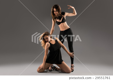 Hot go-go dancers in high heels dancing at studio 29551761