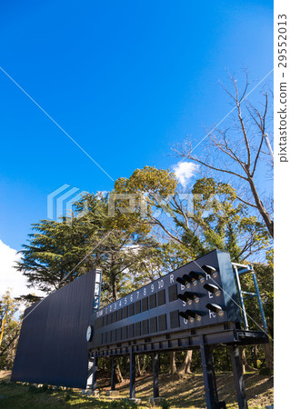 Baseball field scoreboard blue sky 29552013