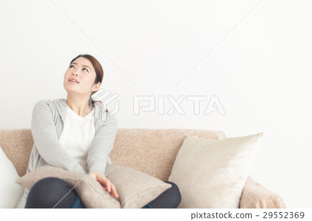 Woman relaxing · white back Woman relaxing · white back 29552369