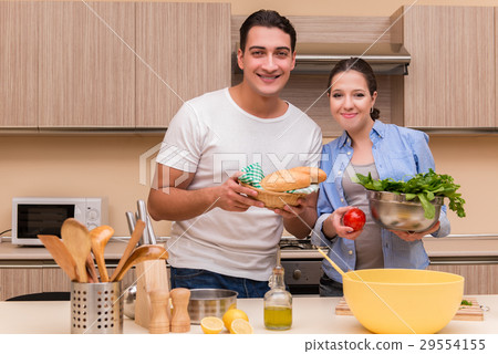 Young family in the kitchen 29554155