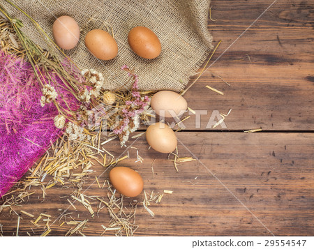 Rural eco background with brown chicken eggs, a 29554547