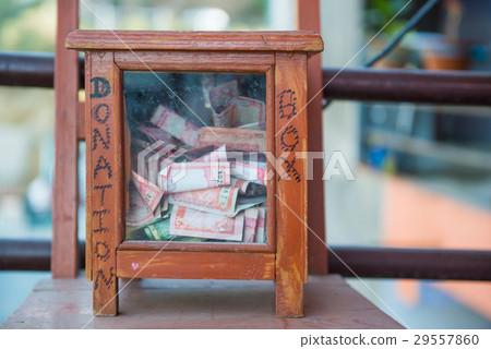 Donation box in front of toilet in Nepal 29557860