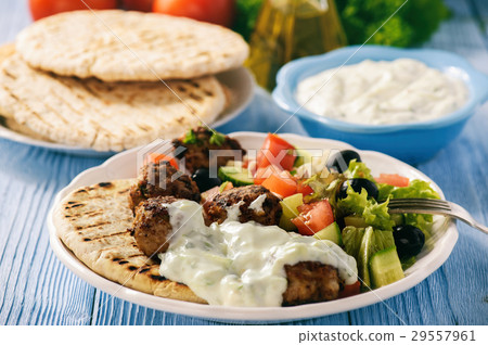 Greek meatballs (keftedes) with pita bread. 29557961