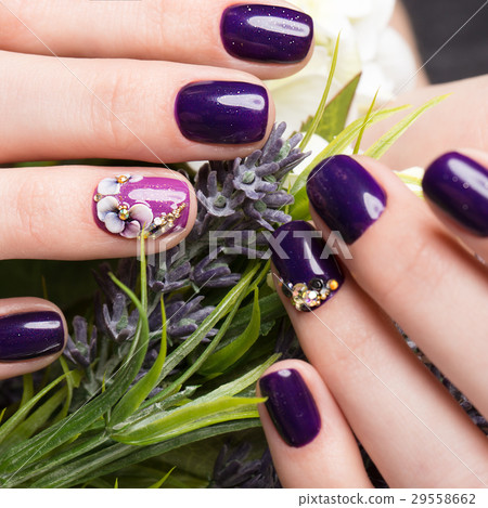 Shot beautiful manicure with flowers on female Shot beautiful manicure with flowers on female 29558662