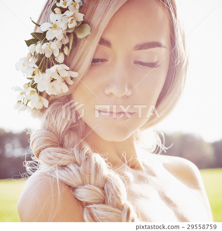 Romantic lady in wreath of apple trees 29558759