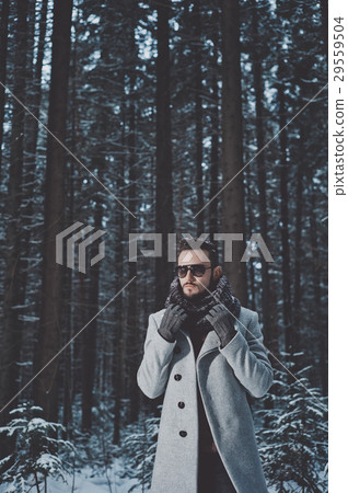 Fashionable handsome man in winter coat 29559504