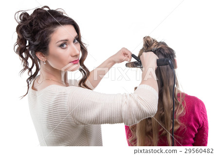 Blond woman from back and hairstylist Blond woman from back and hairstylist 29560482