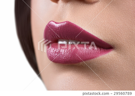 Close up shot of the lips of a woman wearing Close up shot of the lips of a woman wearing 29560789