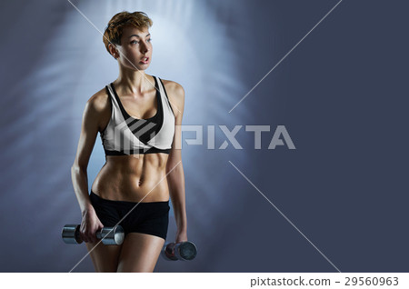 Fit attractive woman wearing sportswear 29560963