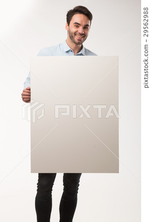 Young happy man showing presentation, pointing on 29562988