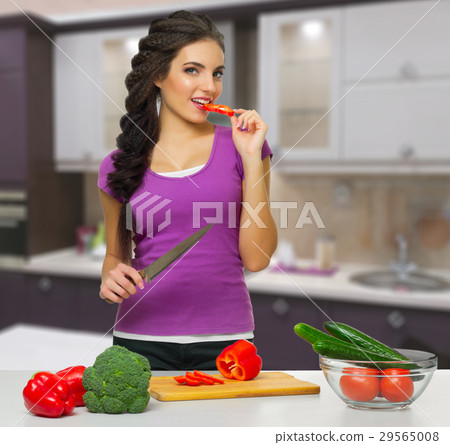 Cooking woman at kitchen Cooking woman at kitchen 29565008