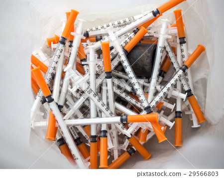 Close up of used syringes in the trash Close up of used syringes in the trash 29566803