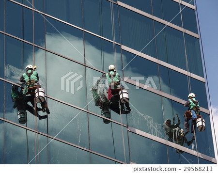 Men Cleaning glass building 29568211