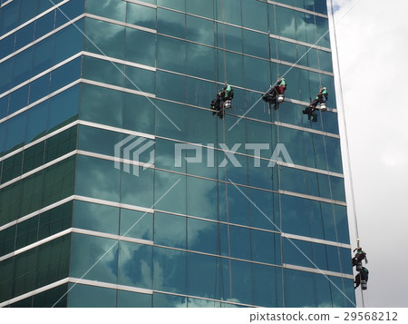 men cleaning glass building men cleaning glass building 29568212