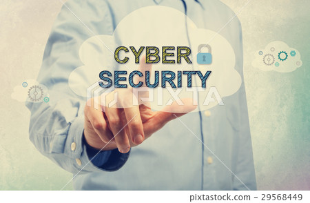Young man pointing at Cyber Security texts 29568449