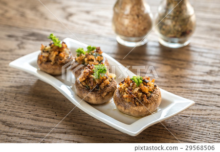 Mushrooms' caps stuffed with cheese Mushrooms' caps stuffed with cheese 29568506