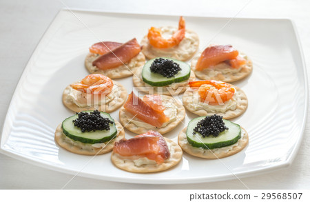 Canape with seafood on the plate Canape with seafood on the plate 29568507