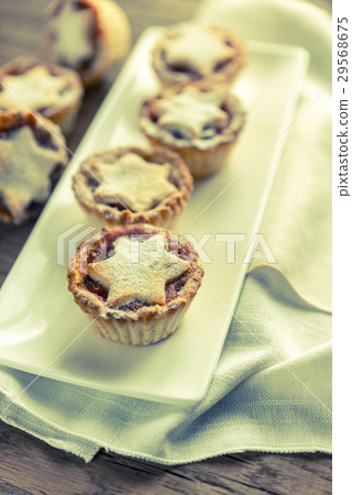 Mince pies with Christmas tree branch Mince pies with Christmas tree branch 29568675