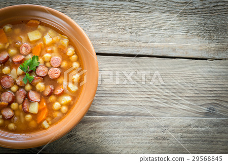 Soup with chickpeas and smoked sausage Soup with chickpeas and smoked sausage 29568845