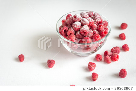 Fresh raspberries in the glass bowl Fresh raspberries in the glass bowl 29568907