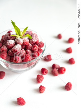 Fresh raspberries in the glass bowl Fresh raspberries in the glass bowl 29568908