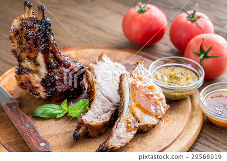 Grilled pork ribs in barbecue sauce 29568919