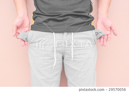 Man showing his empty pockets Man showing his empty pockets 29570056