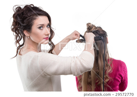 Woman from back and hairstylist 29572770