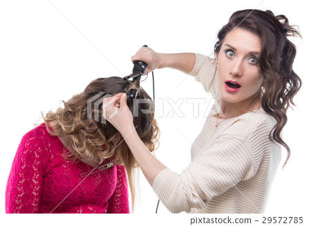 Blond client with curls and gossip hairdresser 29572785