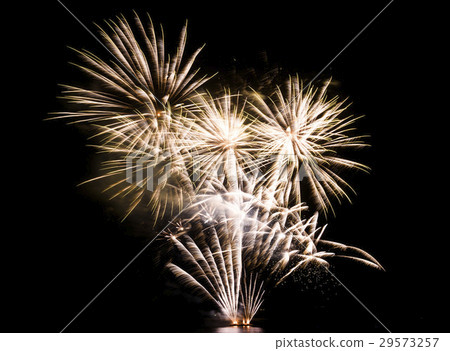 Green colorful fireworks in black background Green colorful fireworks in black background 29573257