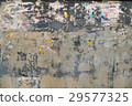 Old painted background wall with pieces of paper 29577325